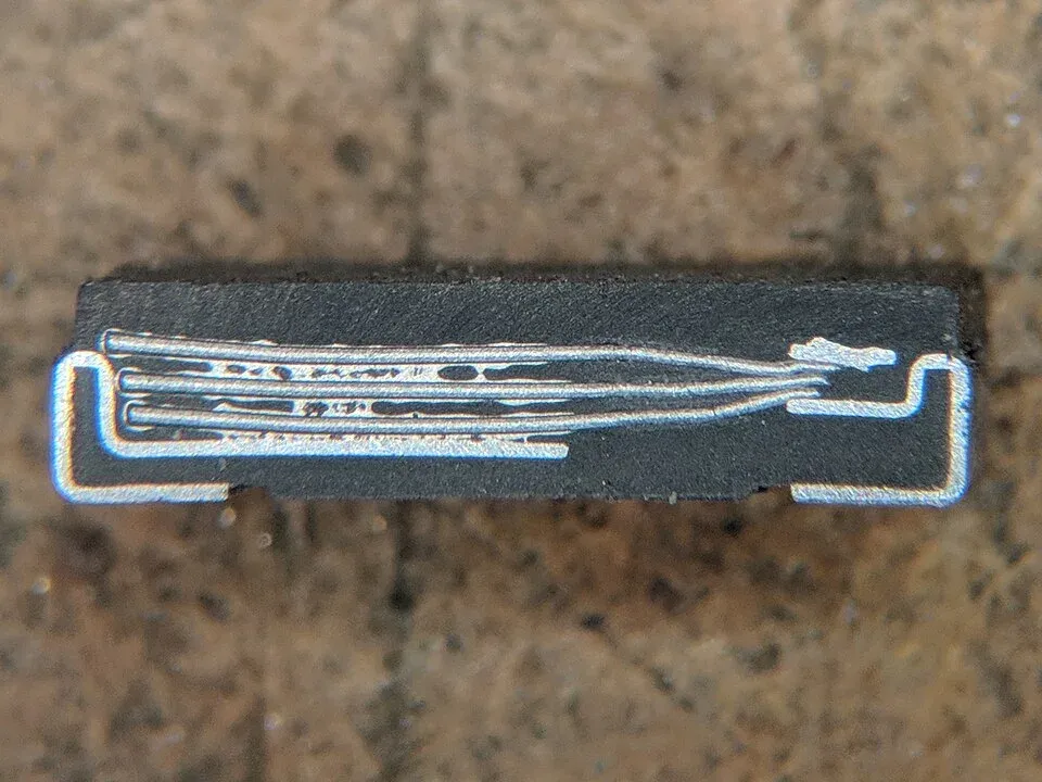 Cross section of a polymer tantalum capacitor showing its internal layers