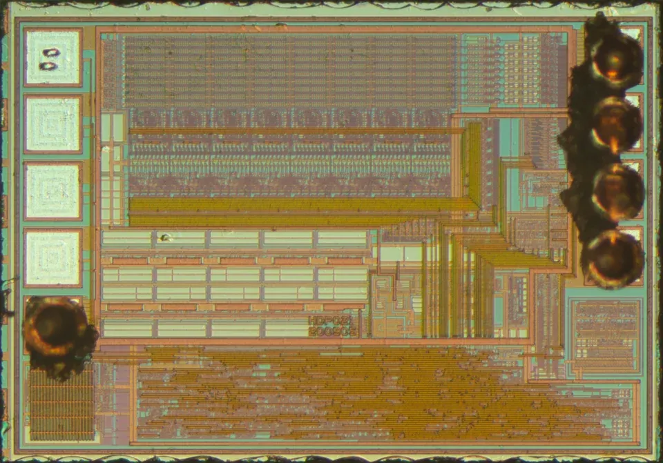 Exposed silicon die of a 24C02 serial EEPROM