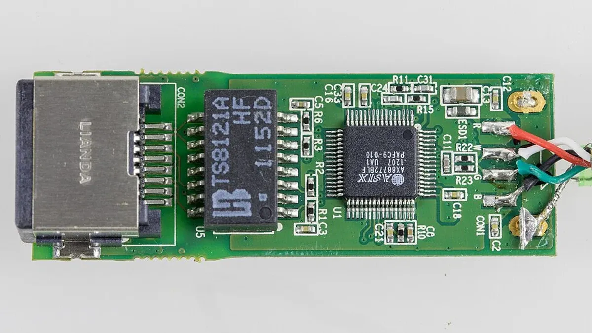 Ethernet interface board with a network connector and associated circuitry