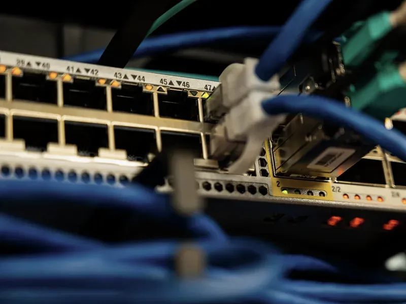 Industrial Ethernet cabling inside a control system illustrating supply pressure on fieldbus and networking ICs