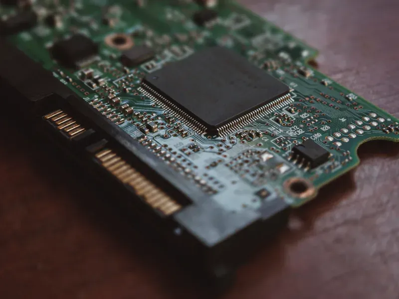 USB ports on a printed circuit board illustrating controller IC feature differences